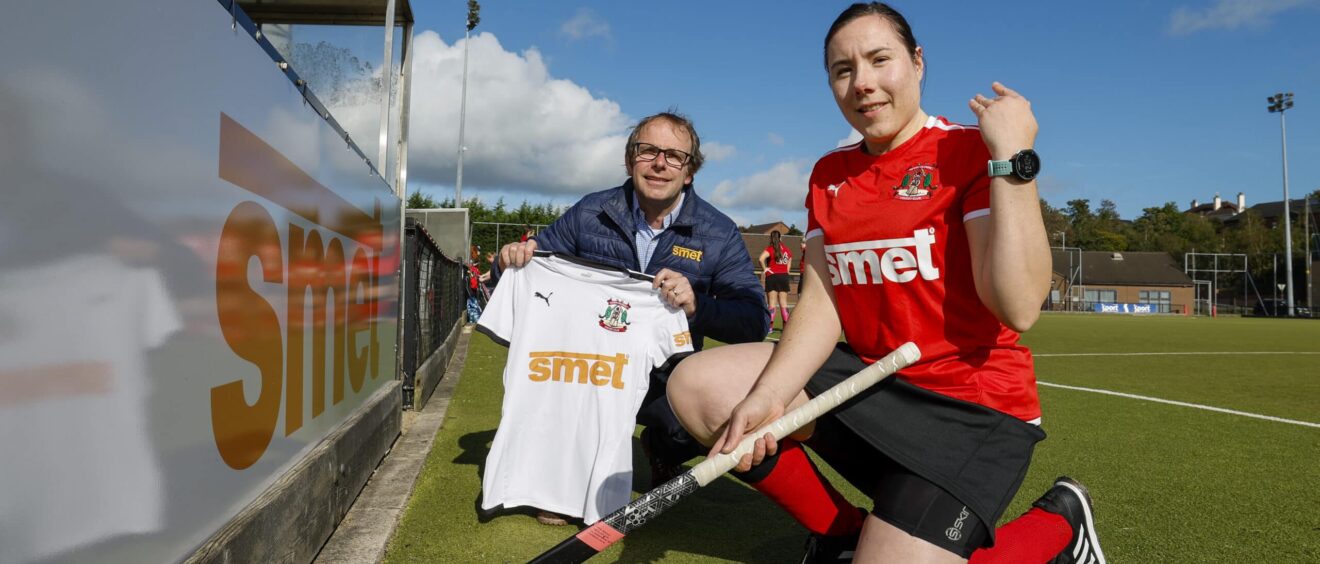 Managing Director of Smet Building Products Joris Smet, with NOHC Ladies 1s Captain Kathryn Baird